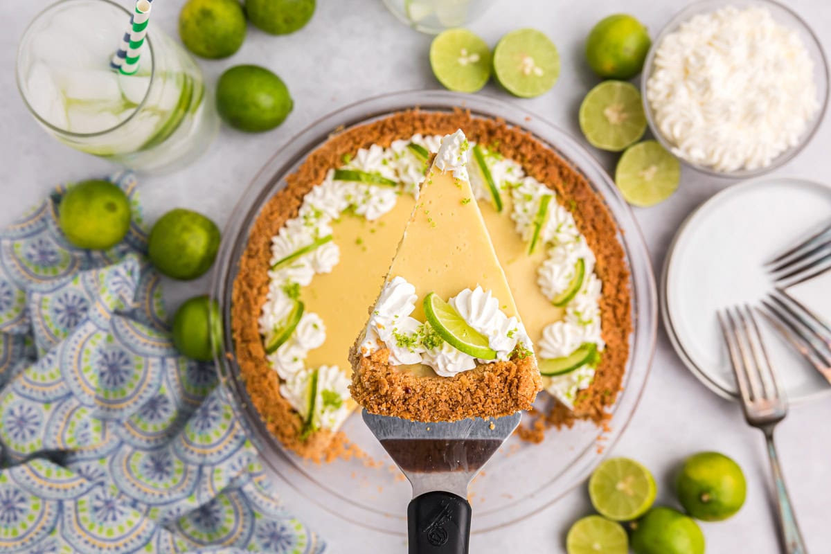 Easy Key Lime Pie recipe with slice taken out of pie.