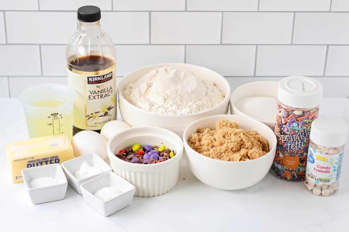 Halloween cookies ingredients on counter.