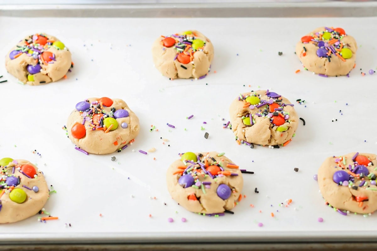 Halloween cookie dough with M&Ms, sprinkles and top.