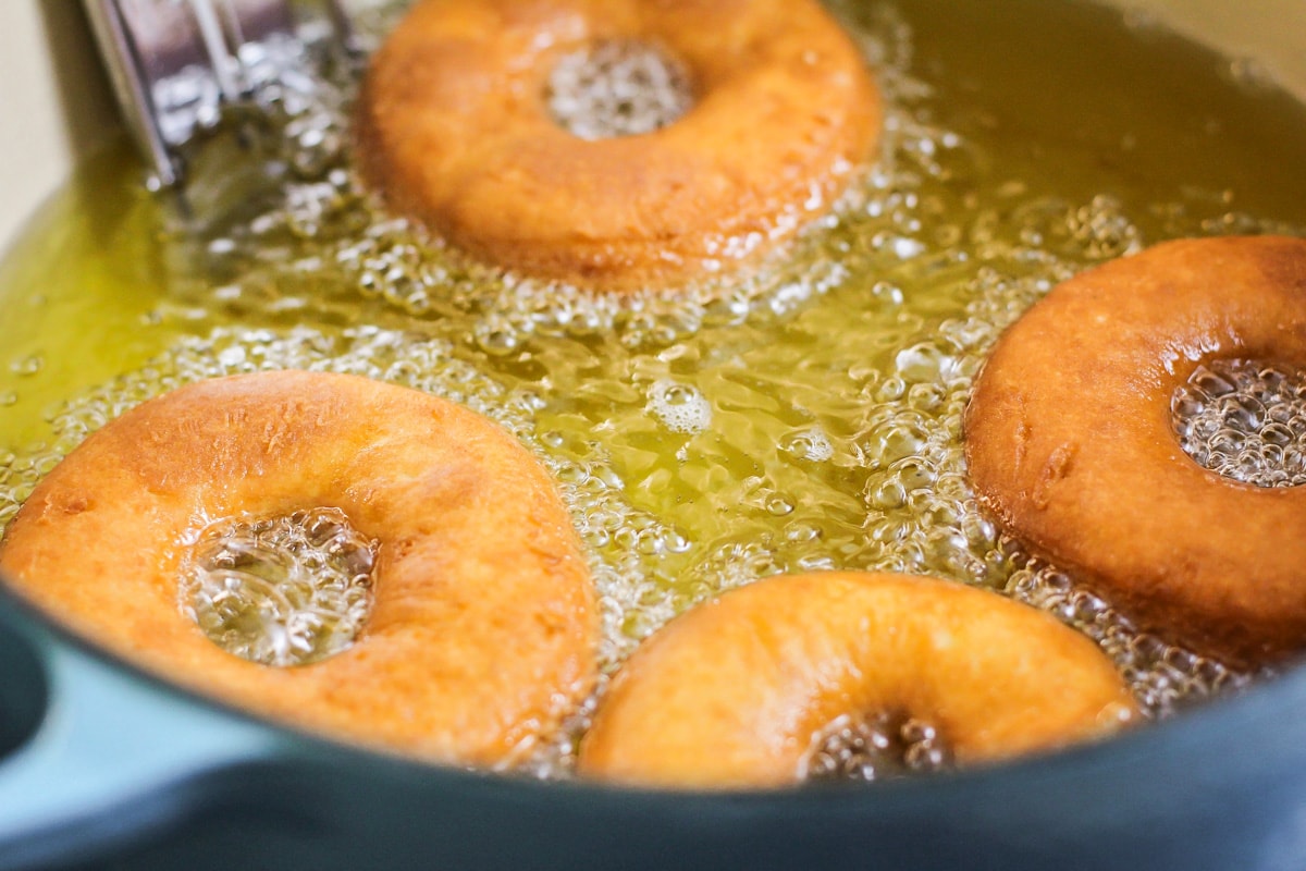 Donuts fried in oil.