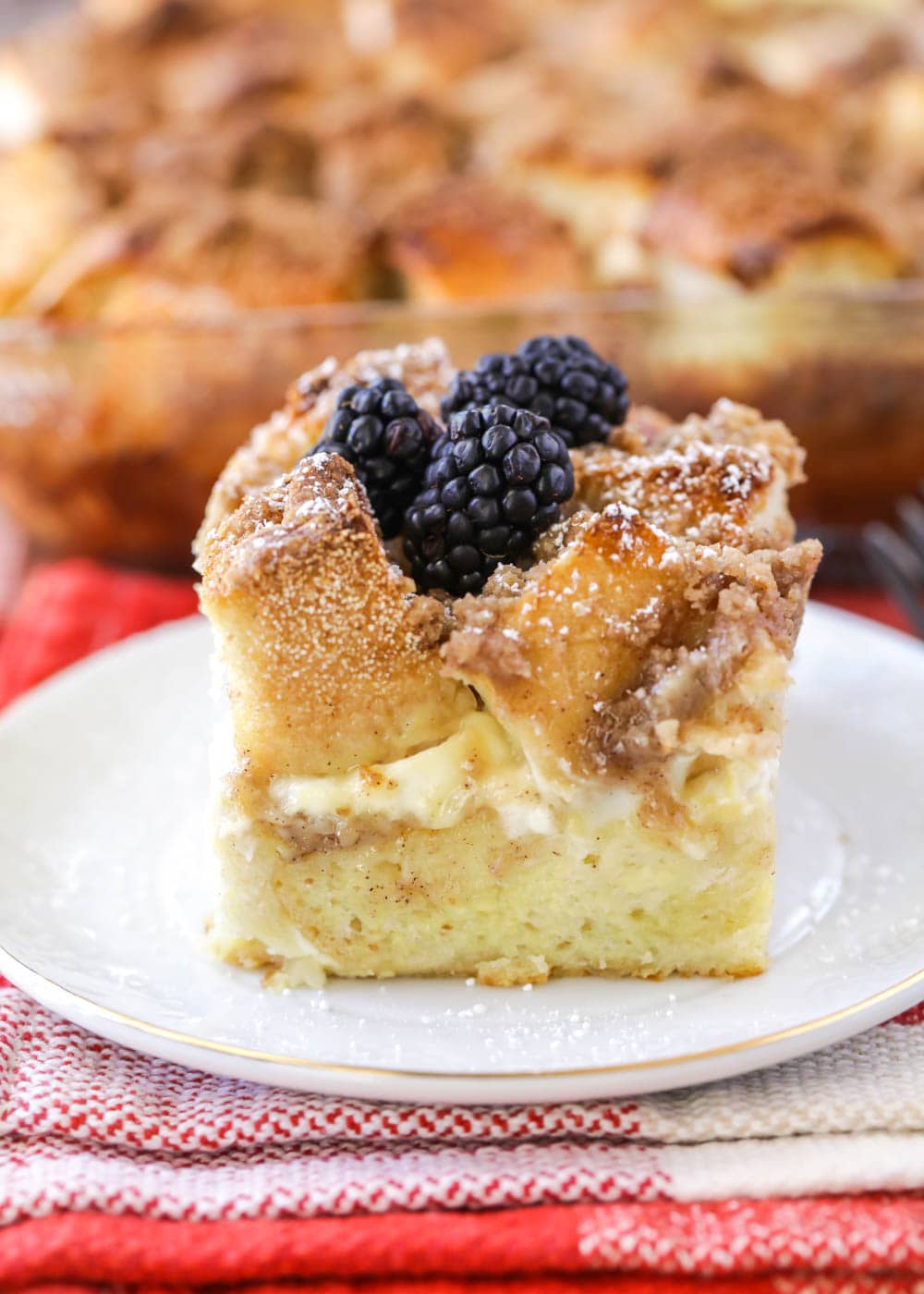 French toast casserole with cream cheese topped with blackberries.