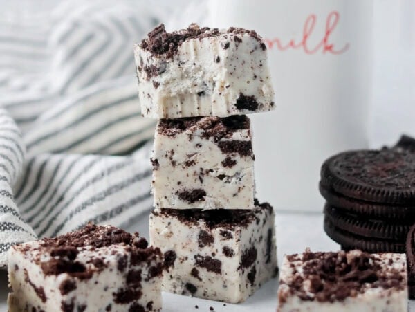 Oreo fudge stacked and served with milk.