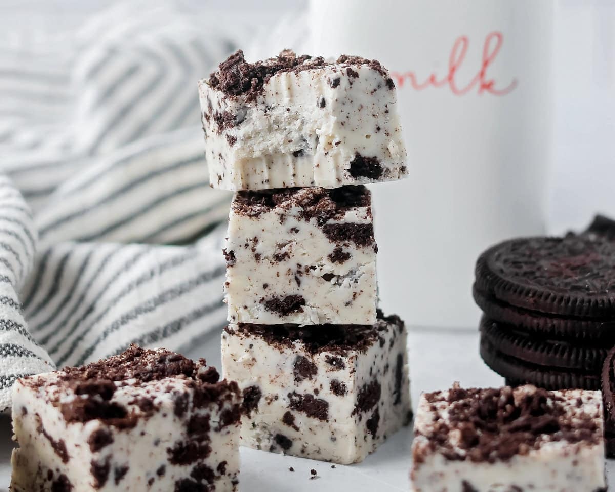 Oreo fudge stacked and served with milk.
