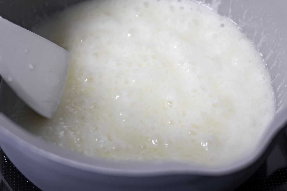 Melted butter in a pan for oreo fudge.