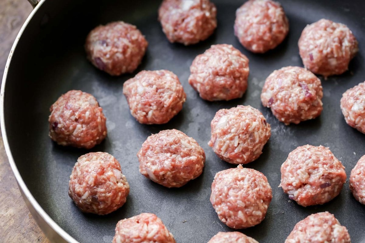 Porcupine meatball recipe in a skillet.