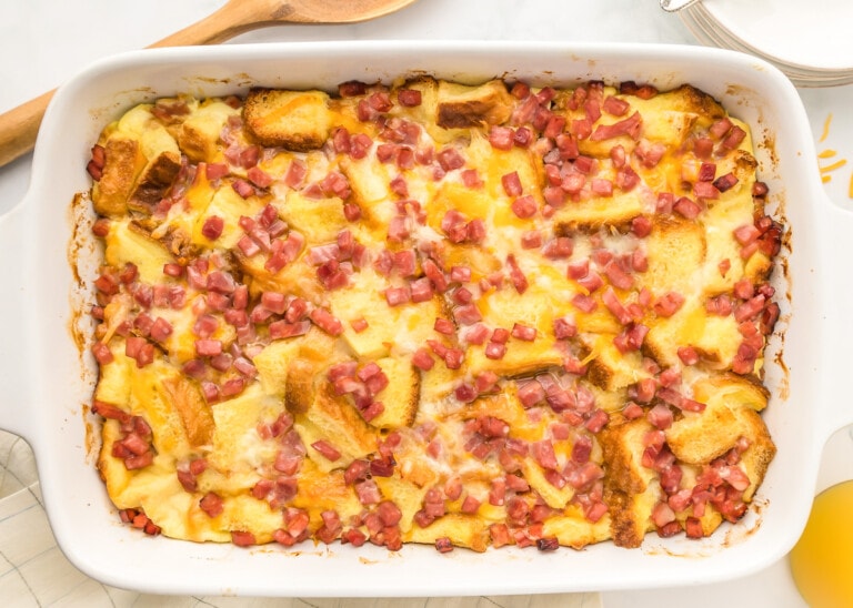 Top view of a breakfast strata recipe in a baking dish.