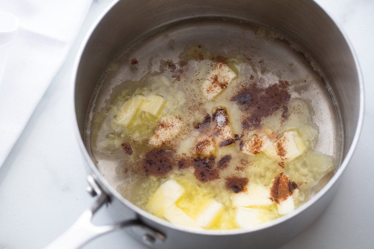 Churros recipe process pics, making dough in a pan.