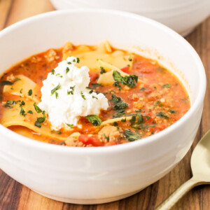 Lasagna soup served in a white bowl.