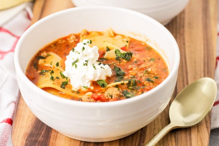 Lasagna soup served in a white bowl.