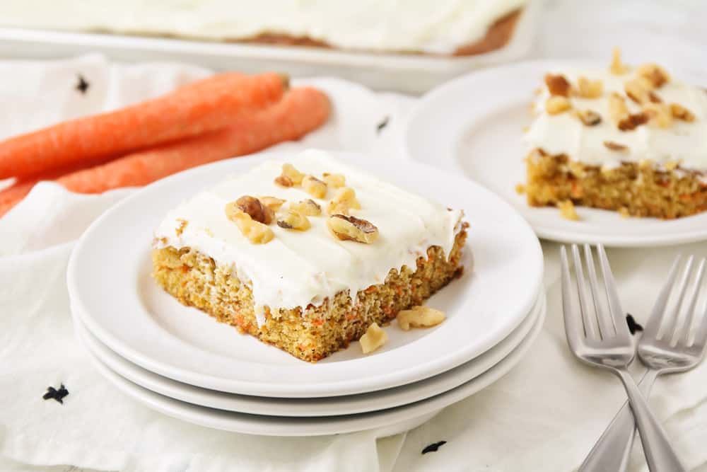 Easy carrot cake recipe sliced and served on a plate.