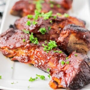 Our country ribs recipe topped with fresh herbs.