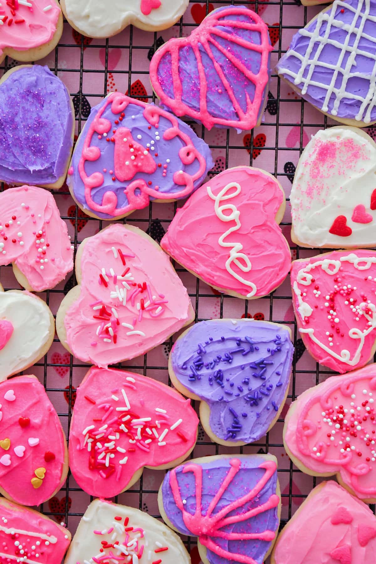 Frosted Valentine Sugar Cookies on wire rack.