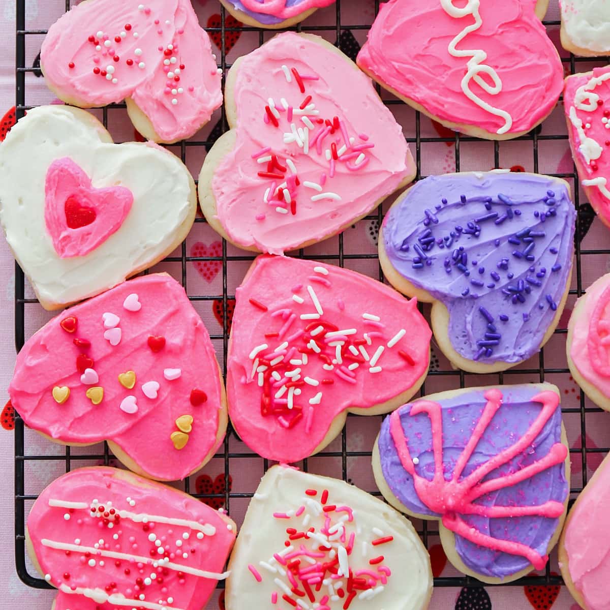Heart shaped valentine sugar cookies with red and pink frositng