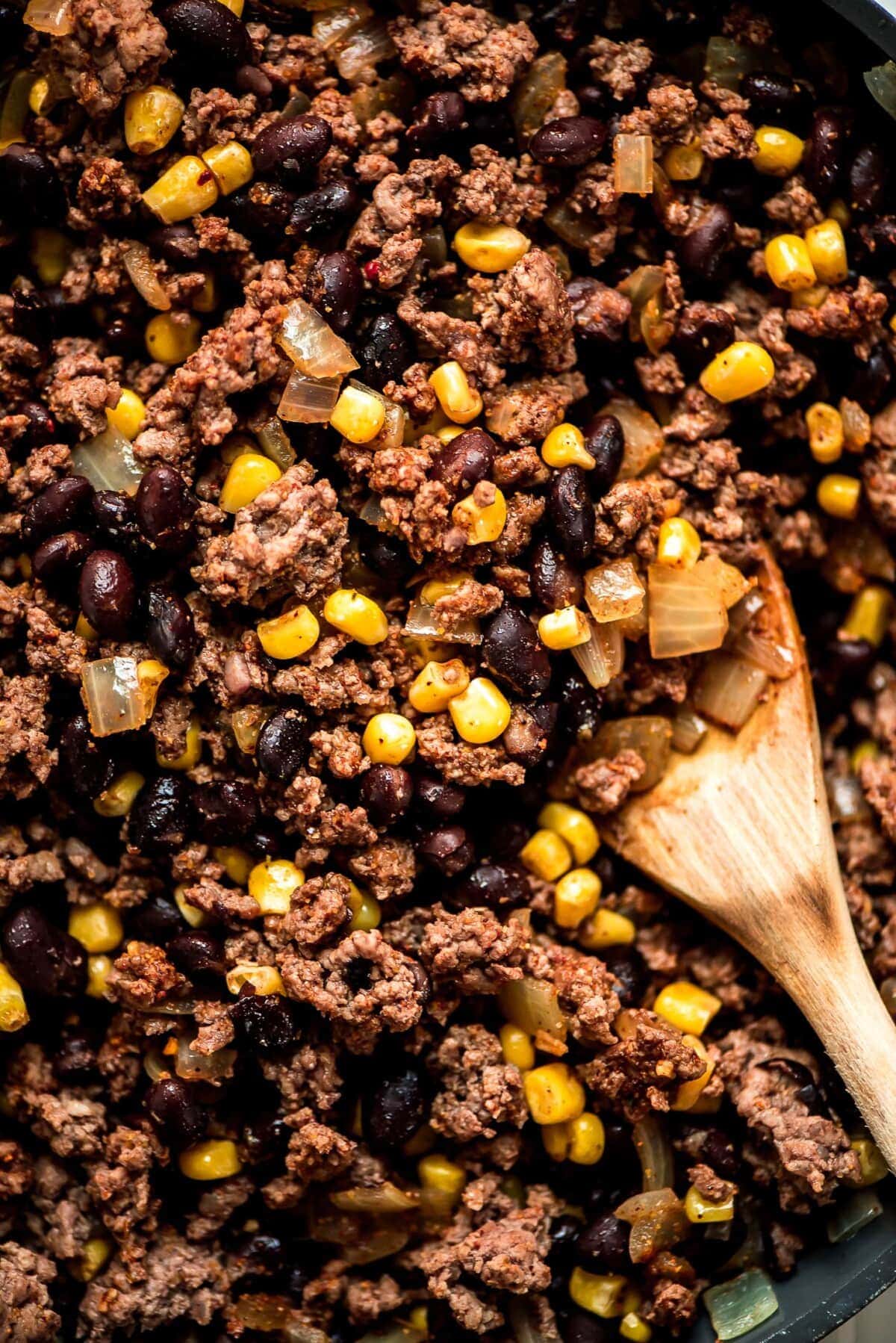 Meat mixture for enchilada casserole close up image.