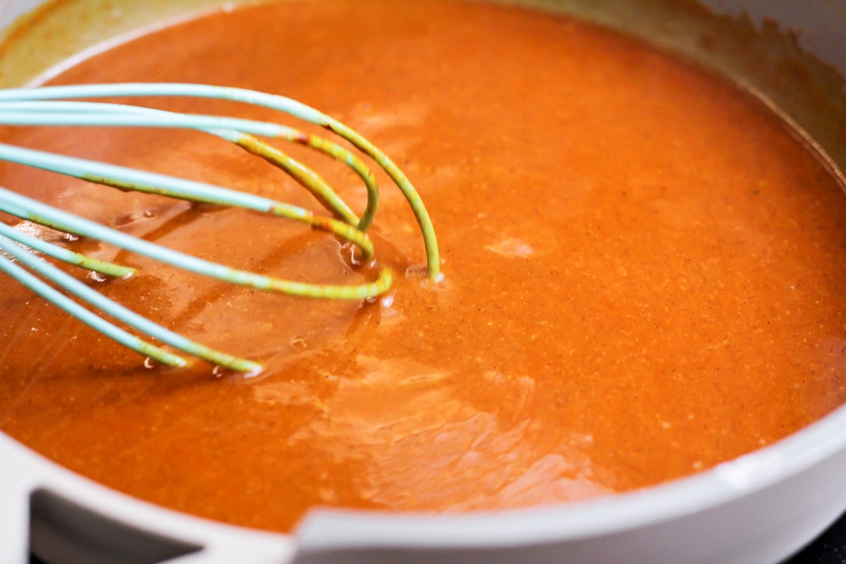 Homemade enchilada sauce in pot.