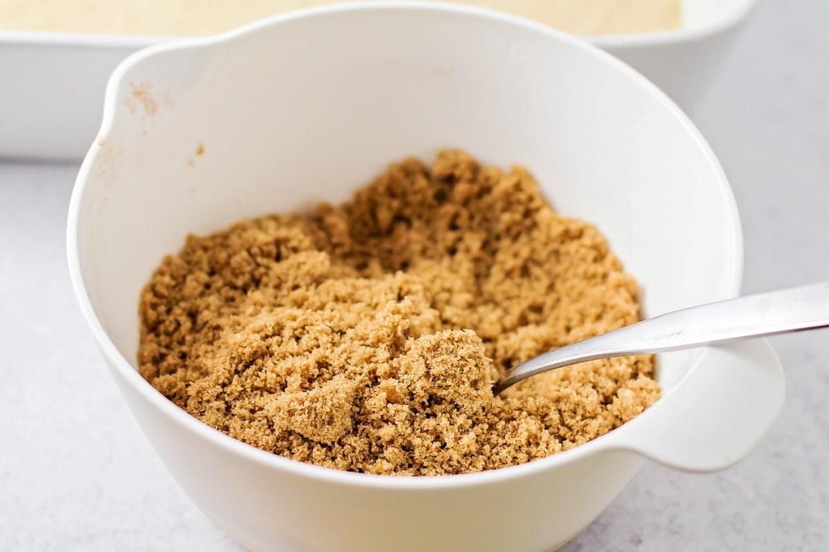Coffee cake brown sugar topping mixed together in bowl.