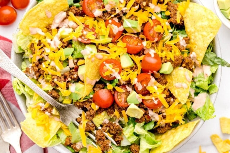 Homemade Taco Salad Dressing recipe on taco salad in bowl.