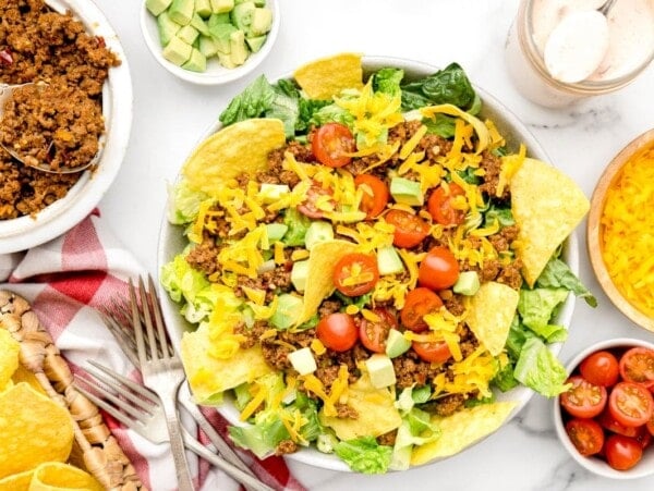 A bowl of taco salad recipe with a homemade dressing.
