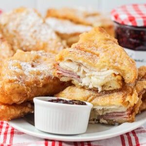 Monte Cristo Sandwich recipe cut and stacked on white plate.