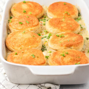 Chicken pot pie casserole baked in casserole dish.