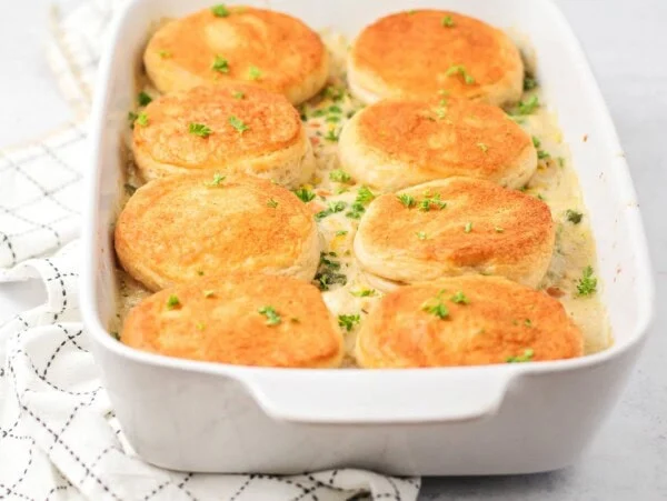 Chicken pot pie casserole baked in casserole dish.