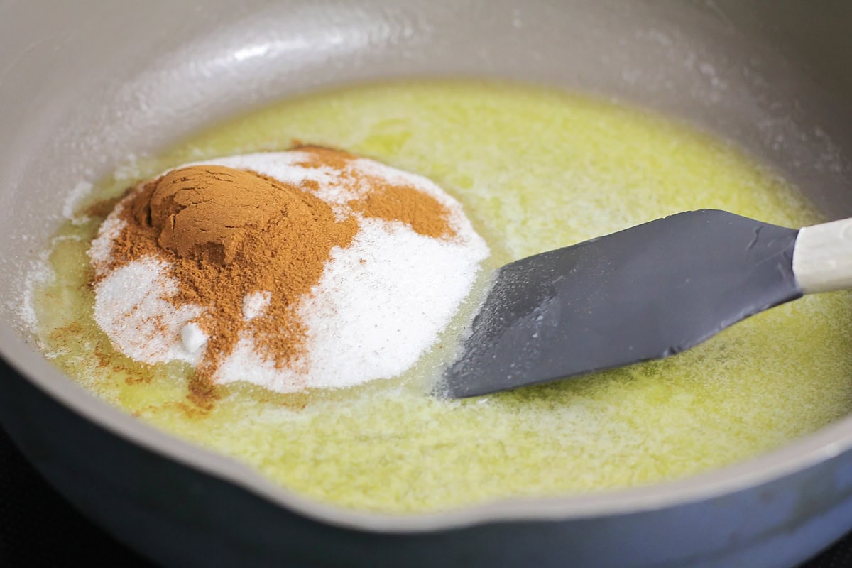 Melting butter and sugar mixture in a pan.