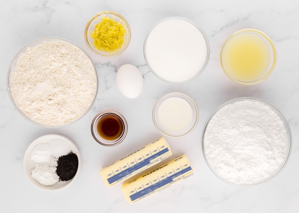 Ingredients for lemon poppy seed cookies on a kitchen counter.