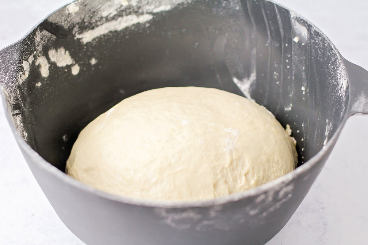 Process image of making homemade pizza dough.