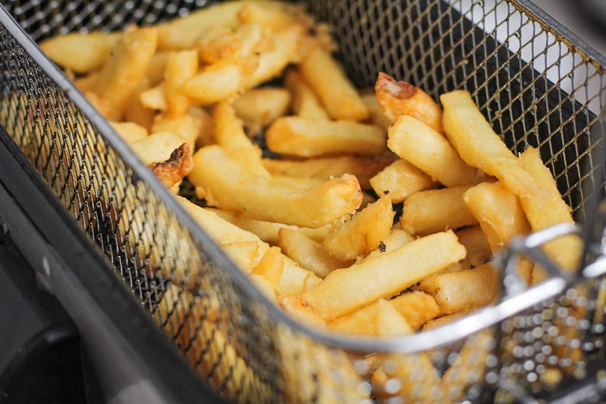 Fries in a fry baskett.