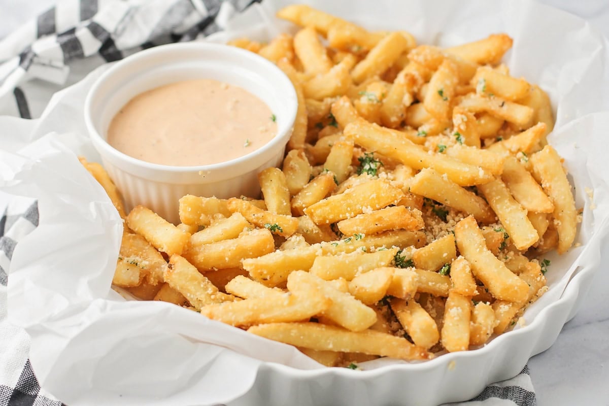 Seasoned pommes frites served with cajun remoulade.