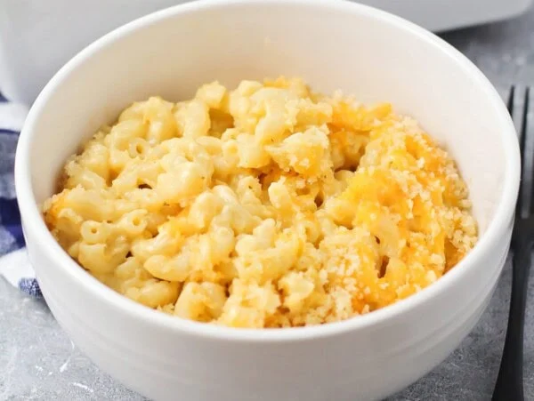 Homemade Velveeta Mac and Cheese recipe in white bowl.