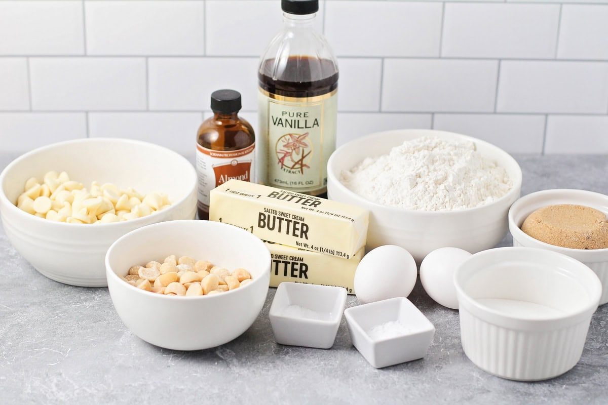 White chocolate chip macadamia nut cookie ingredients on a kitchen counter.