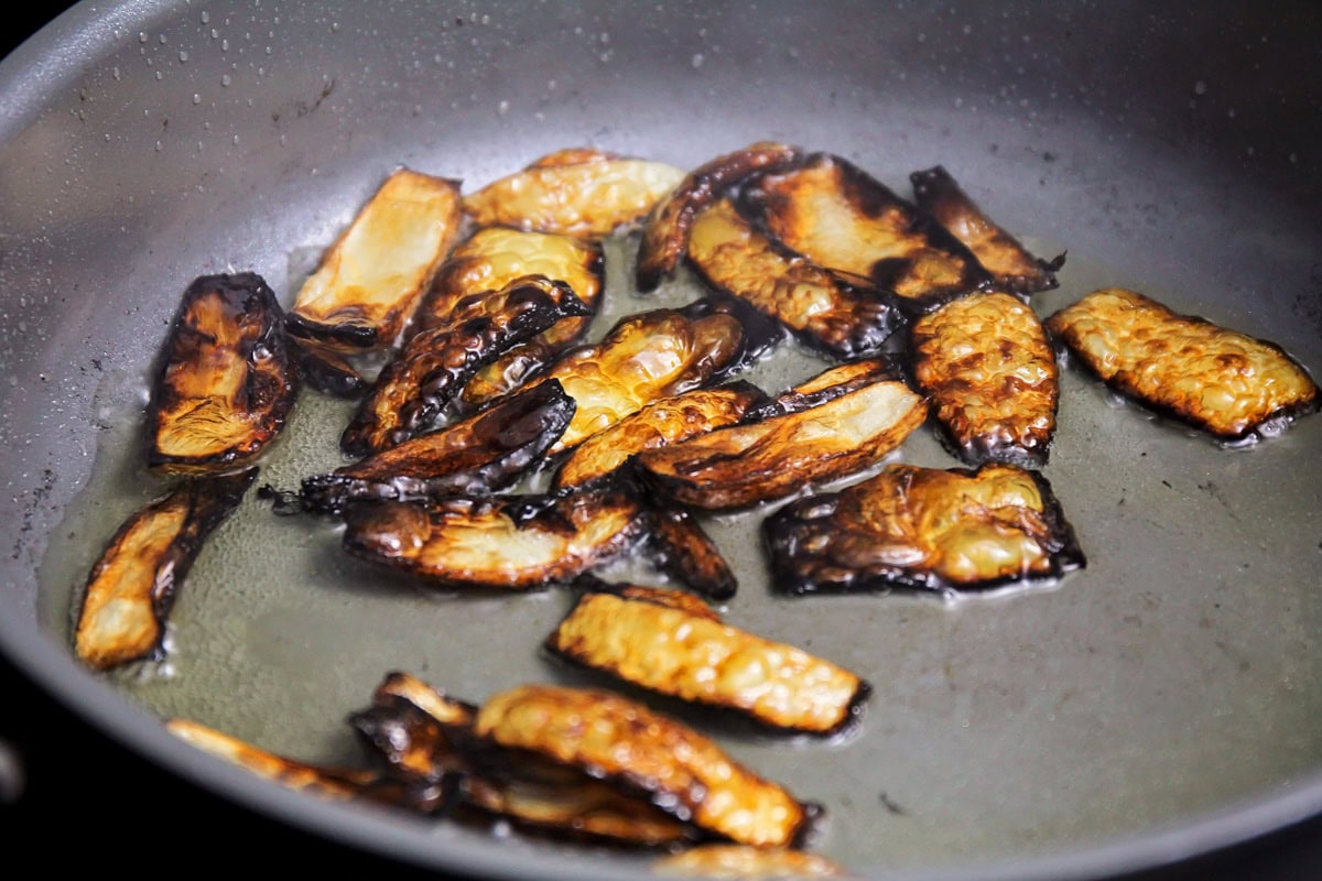 Onion fried until blackened for pupusas filling.