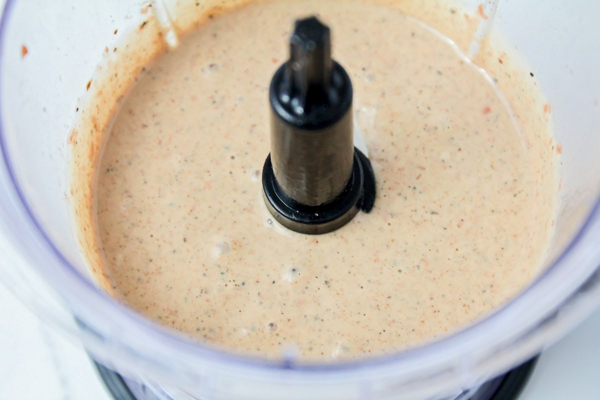 Pupusas filling mixed together in blender.