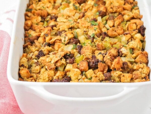 Close up image of sausage stuffing recipe in casserole dish.