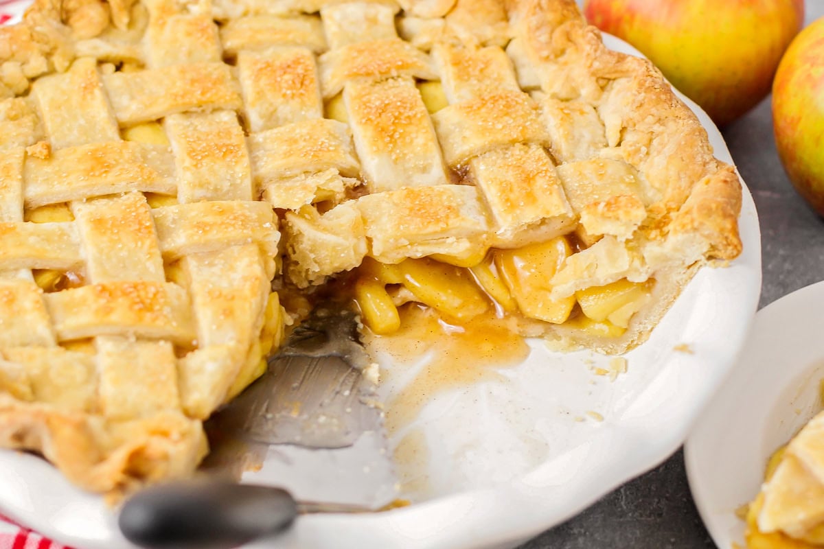 Apple pie filling in a lattice topped apple pie.