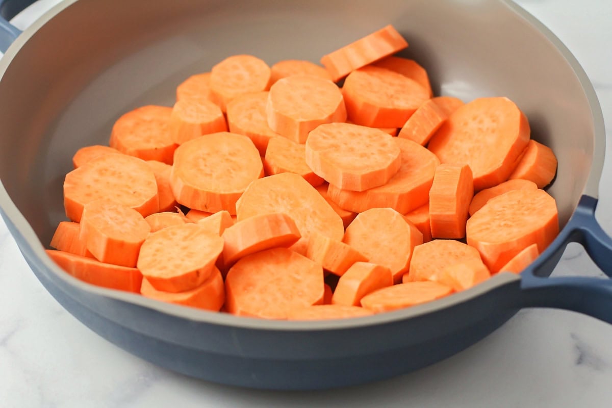 Sliced yams in a pan.