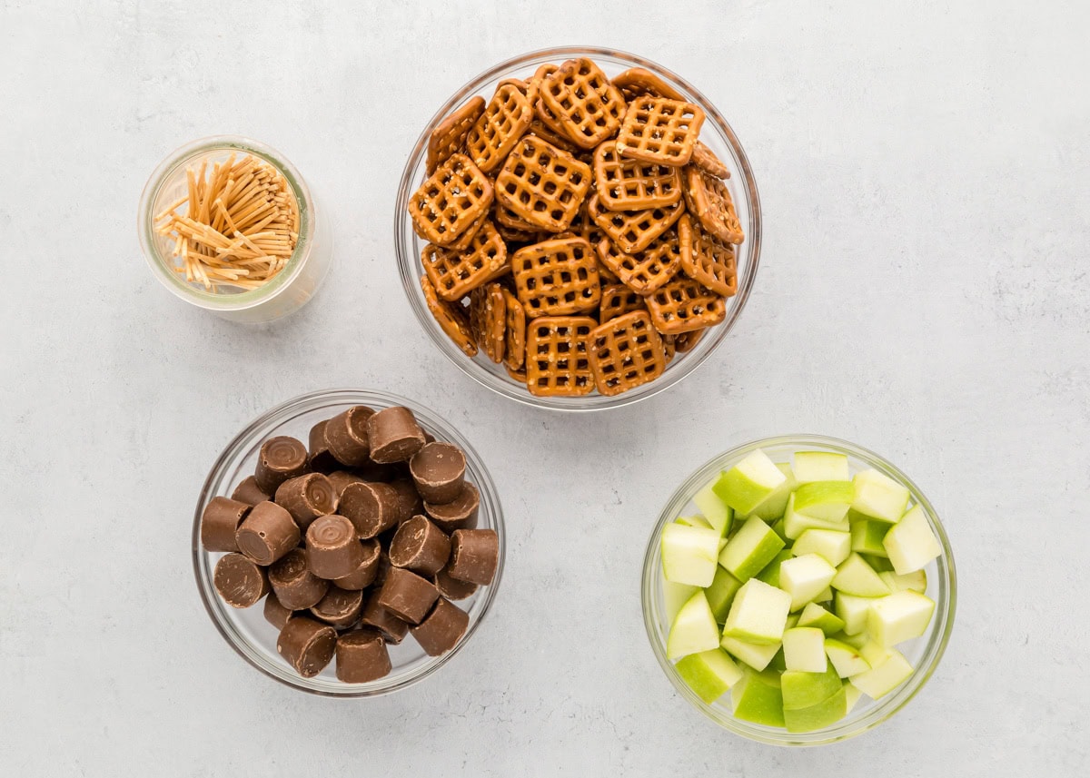 Caramel apple bite ingredients on a kitchen counter.