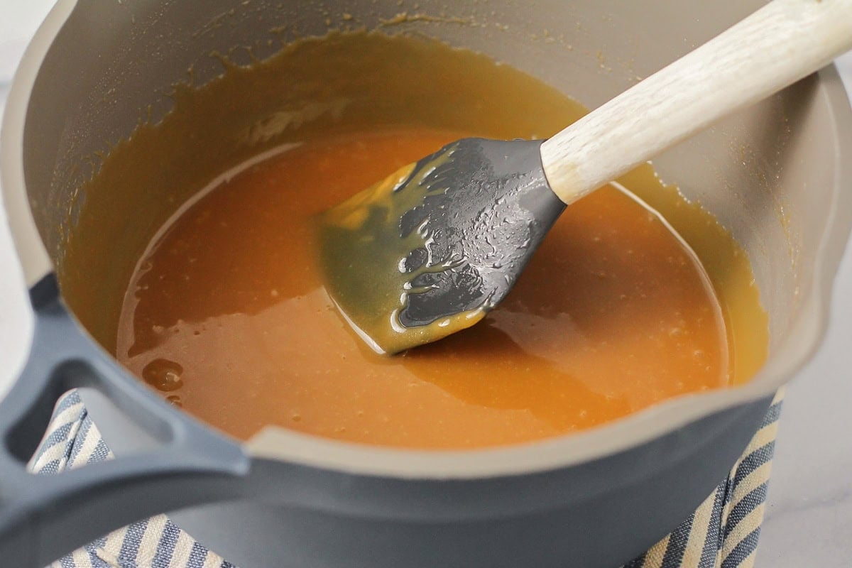 Melting caramel in a pot.