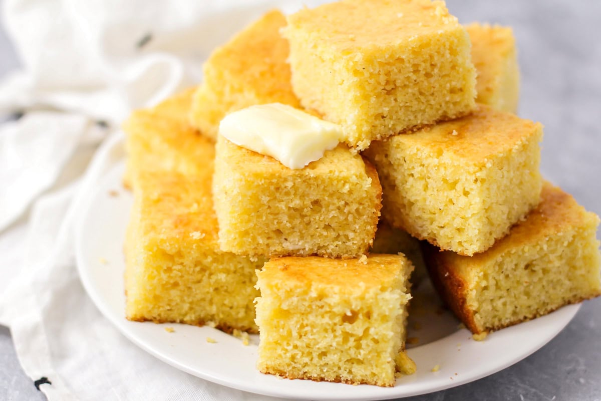 Cornbread pieces stacked and placed on top of each other.