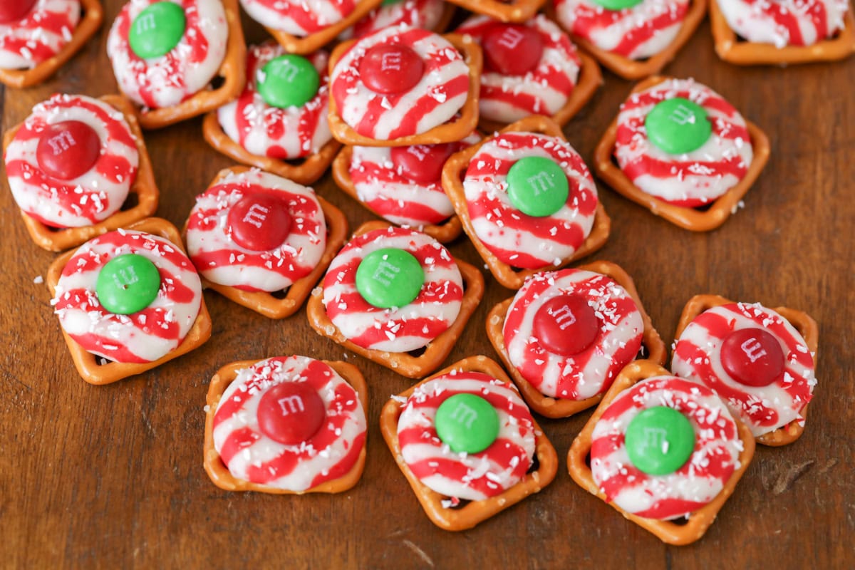 A pile of holiday pretzel bites on a kitchen table.