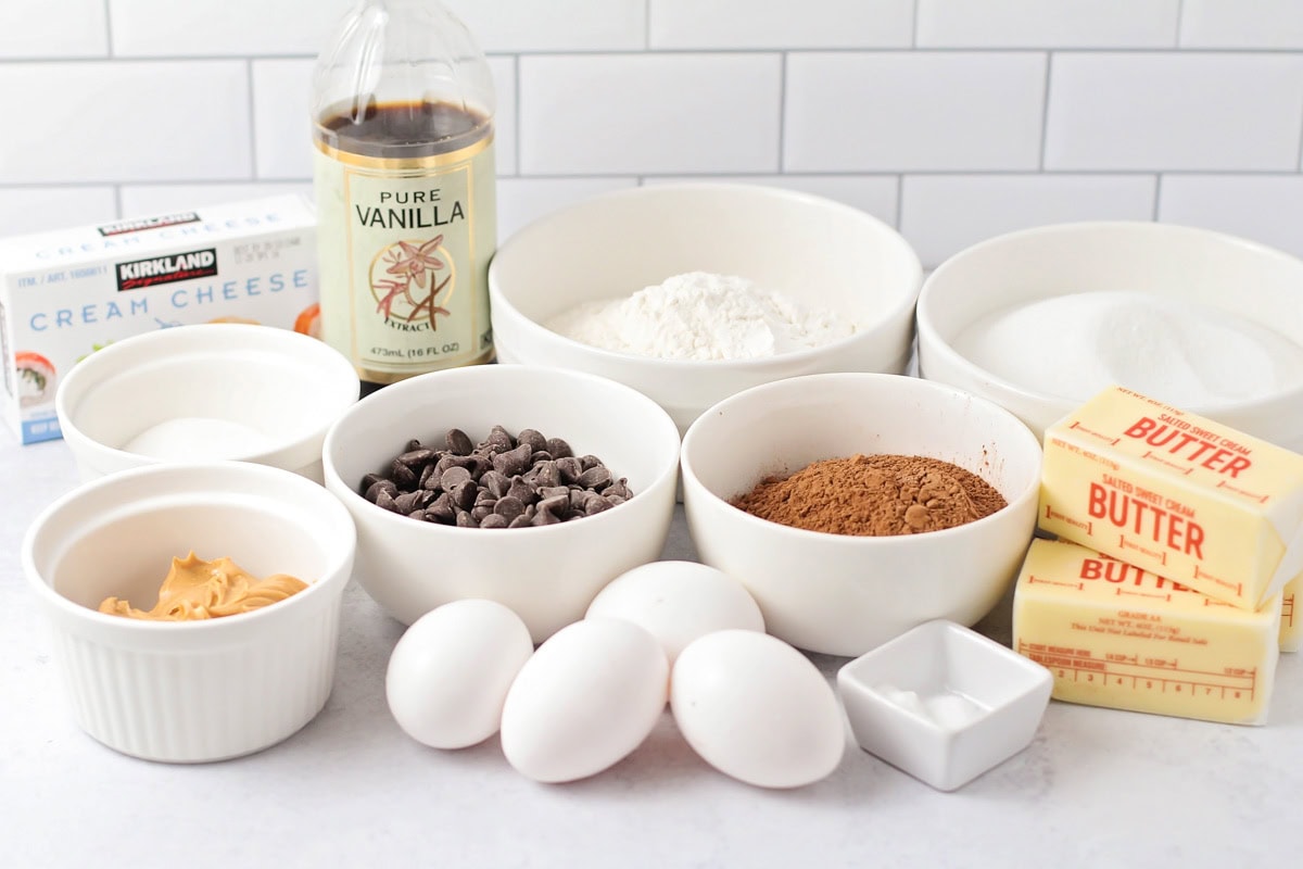 Ingredients for peanut butter brownies on a kitchen counter.