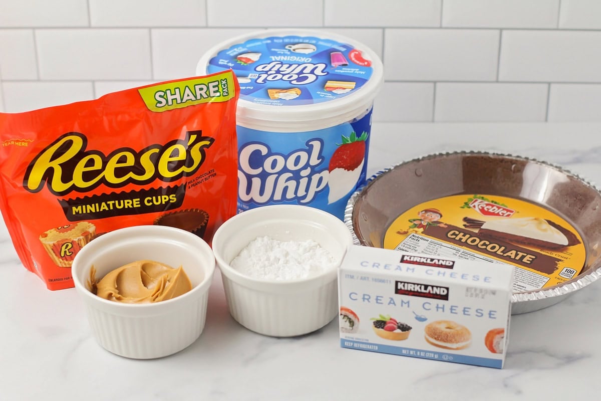 Ingredients for peanut butter pie on a kitchen counter.