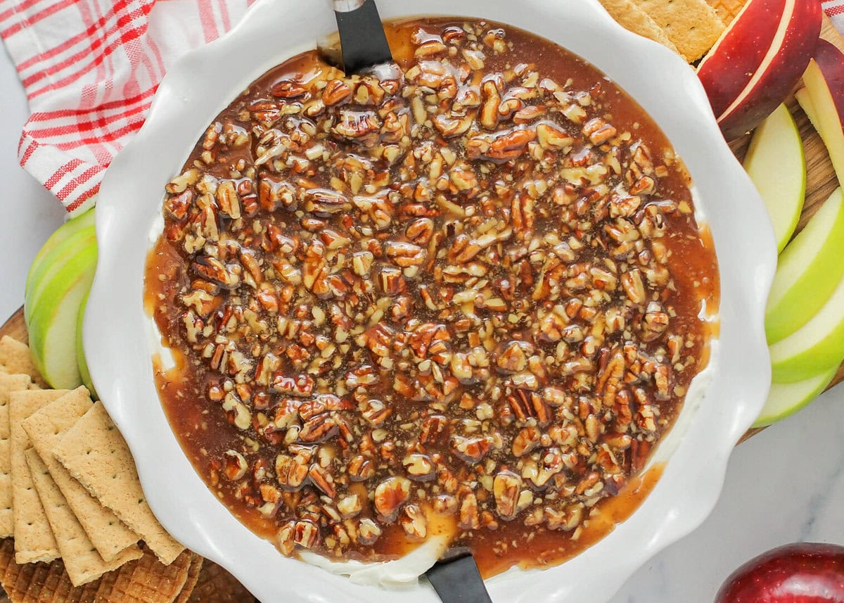 Pecan pie dip served with apples and crackers.