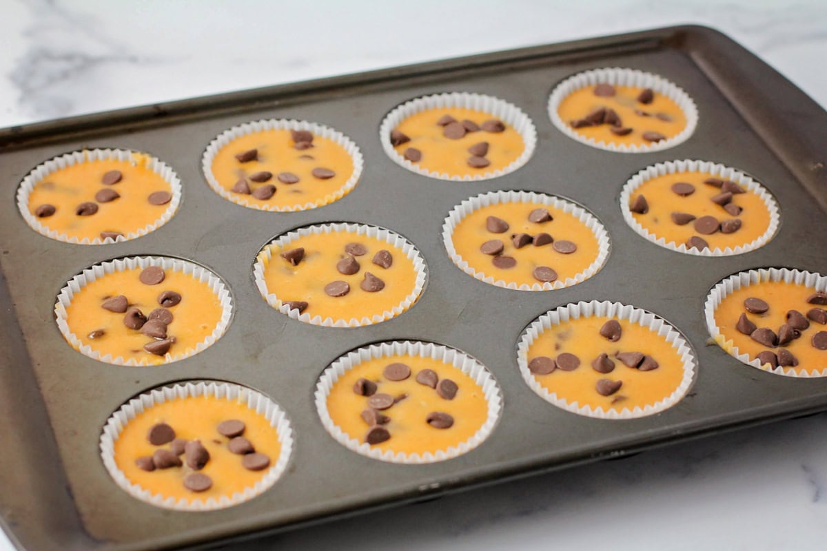 Batter filled muffin tins ready for baking.