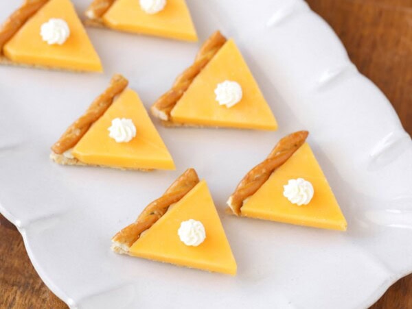 Pumpkin pie crackers on a plate.