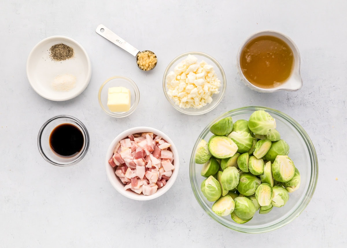 Ingredients for Brussels sprouts on a kitchen counter.