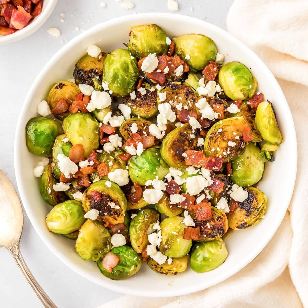 A white bowl of Thanksgiving Brussels sprouts.