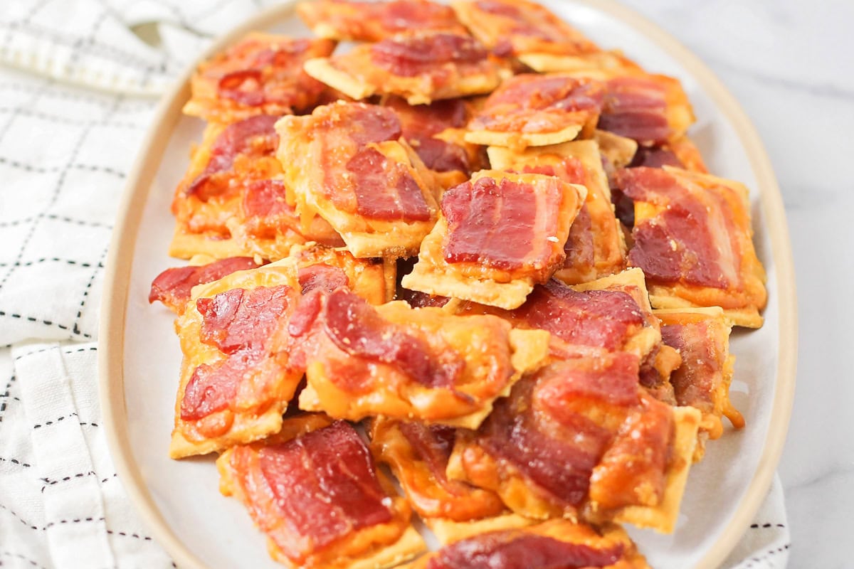 A serving platter of bacon crackers.