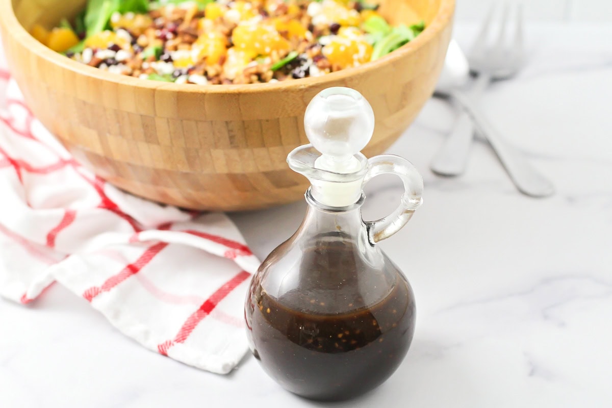 Balsamic vinaigrette in a glass bottle.